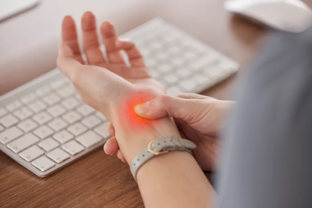 Person experiencing Carpal tunnel syndrome