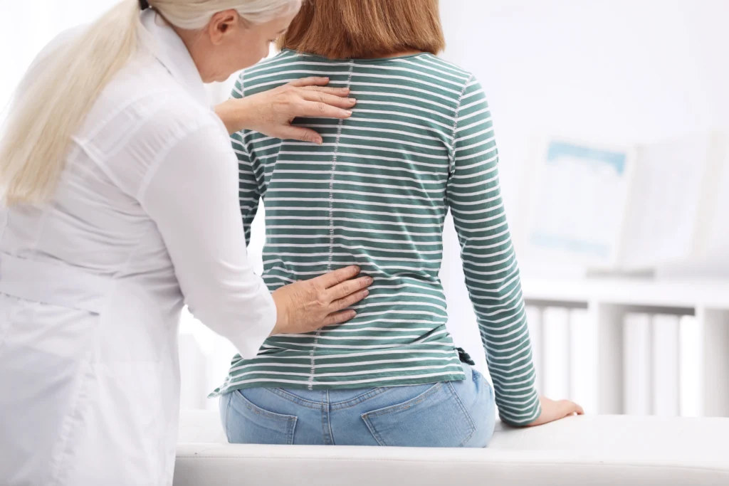 A Chiropractic Specialist checking Herniated Discs of a patient