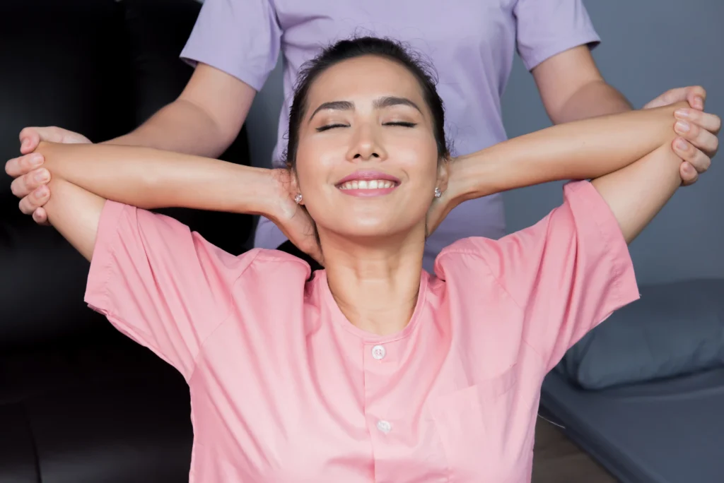 Happy patient with chiropractor
