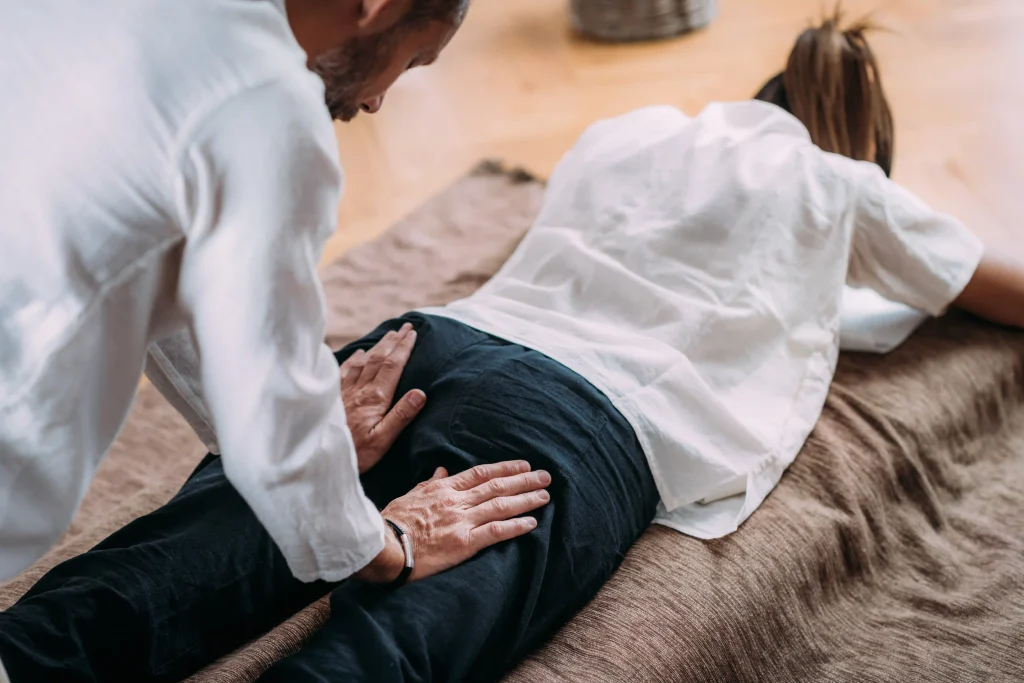 Patient doing rehabilitation exercises with professional supervision