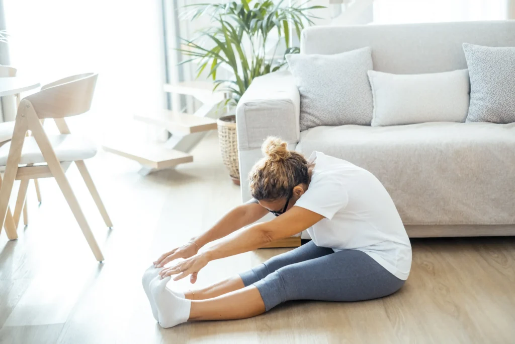 Woman Stretching to maintain better posture and spinal health