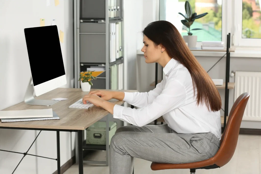 Woman sitting in a Poor Posture